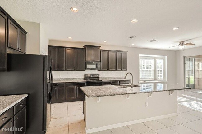 Foto del edificio - 5 br, 4 bath House - 6812 Goldflower Ave
