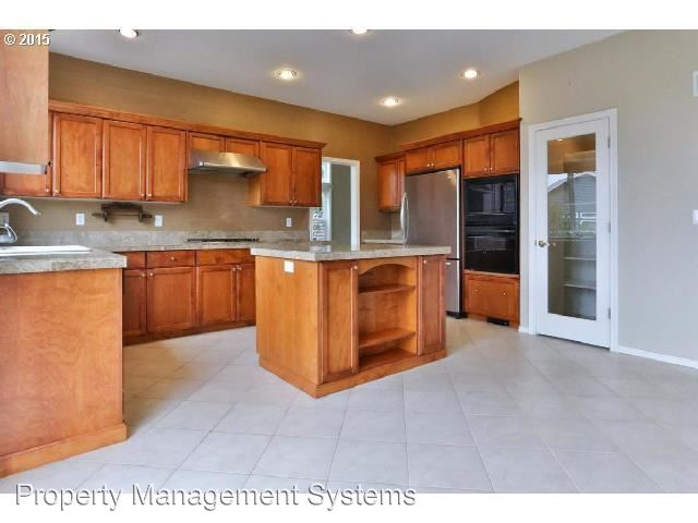Building Photo - 9087 SE Highgate Dr