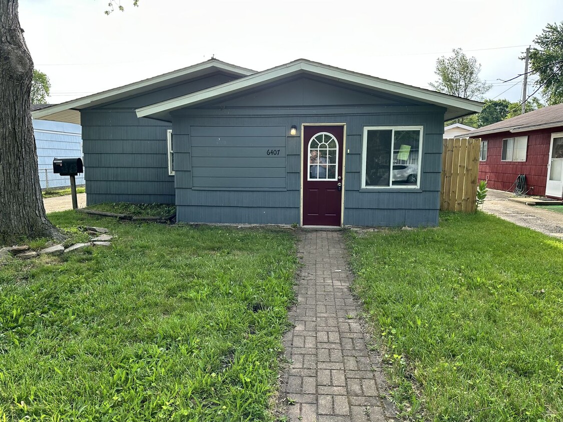 Primary Photo - Updated 3 Bedroom with Private yard and AC.