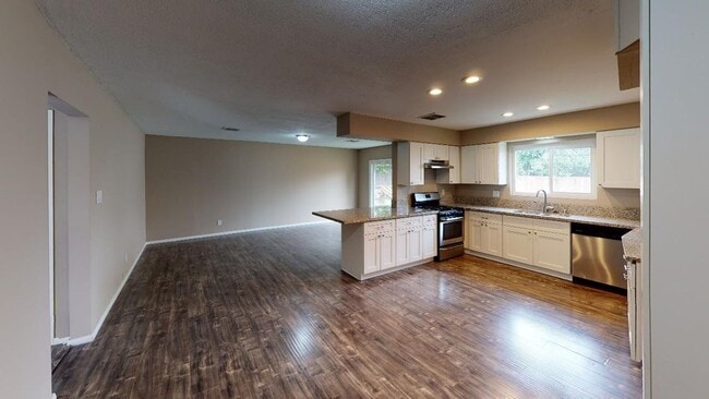 Photo - Available now! Updated with New Paint! 4/2 Single Story home in the heart of Loma Linda for Lease!