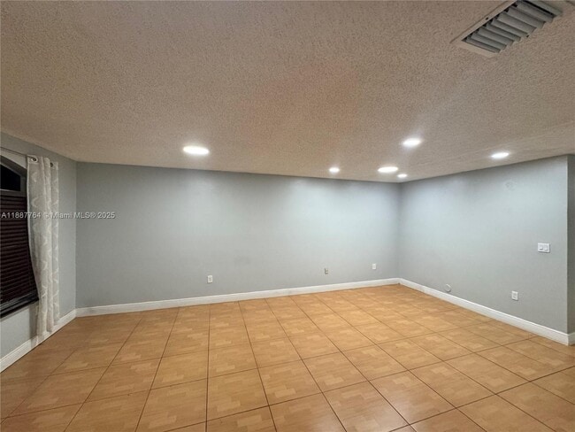 Building Photo - 7005 NW 173rd Dr