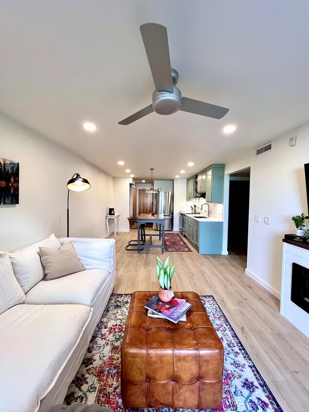 Newly remodeled with West Elm cozy couch and electric fireplace in Living Room - 228 S Cottonwood Rd