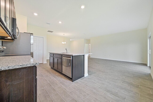 Building Photo - 3 + Den Home in NW Cape ~ Brand New ~ High...