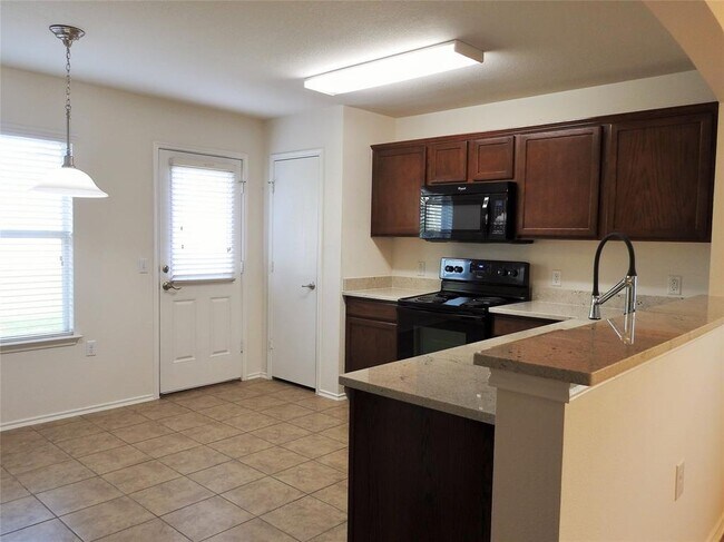Building Photo - 5513 Nelson Oaks Dr