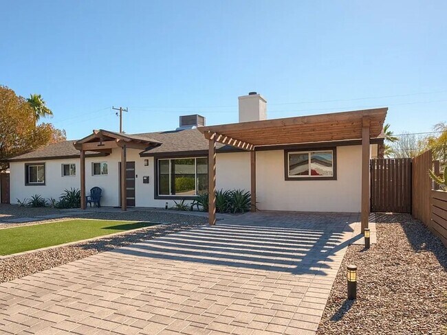 Building Photo - Welcome to Your 4BR Dream Home in the Hear...