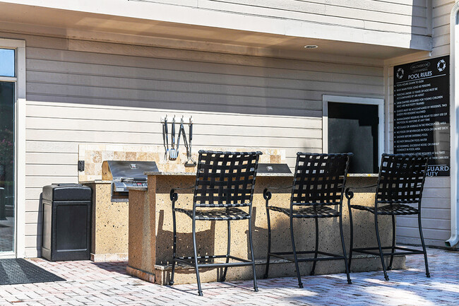 Poolside Gas Grilling Area - WillowBrooke Apartments