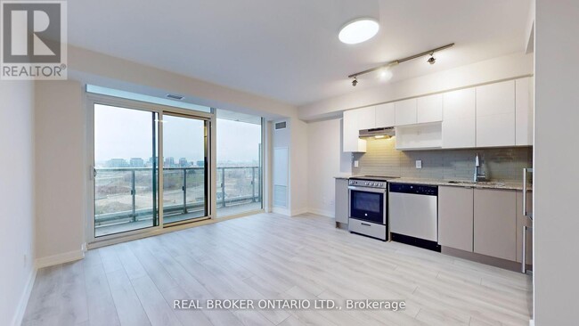 Building Photo - 120-1120 Varna Dr