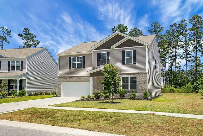 Building Photo - Spacious 6 BR, 3 Full BAs, 2 Car Garage Ho...