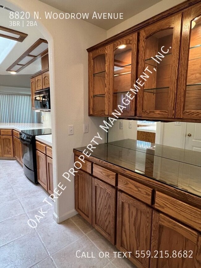 Building Photo - 8820 N Woodrow Ave