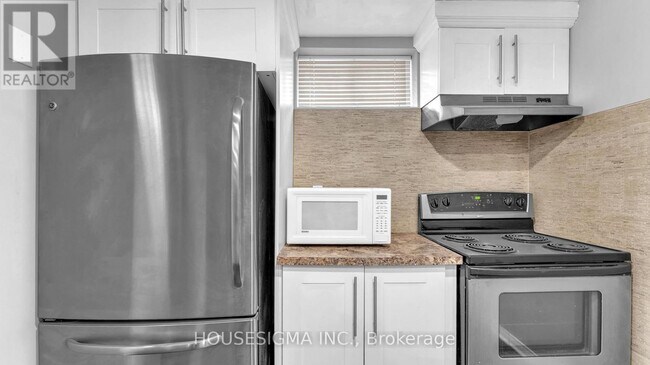 Photo du bâtiment - 66 Grand Ave