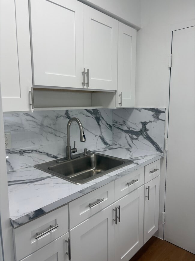 1 dormitorio Cocina - Palmetto Golf Club Apartments