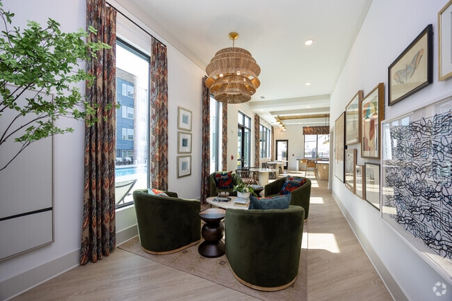 Clubroom - The Refinery at Sugar Hill Apartments and ...