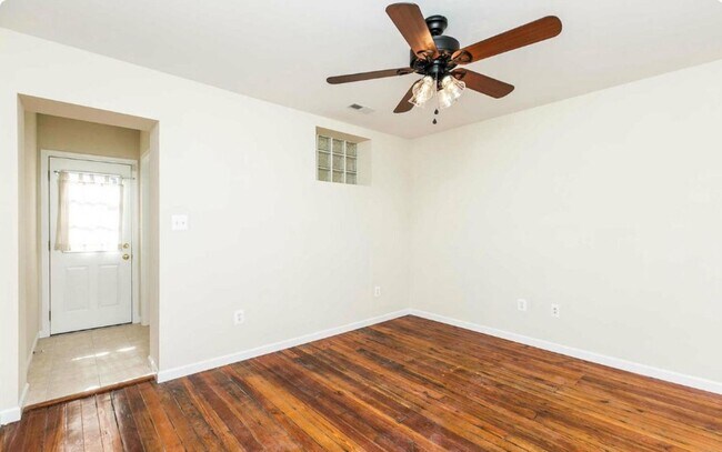 Building Photo - Charming 2bdrm 2.5 bath Patterson Park home with parking and rooftop deck