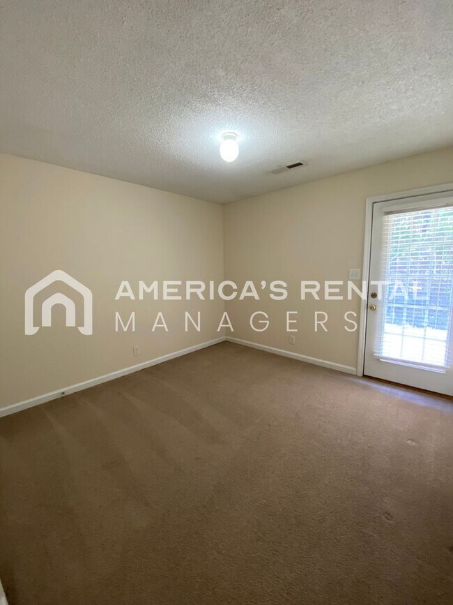 Building Photo - Check out this Townhome For Rent! Located ...