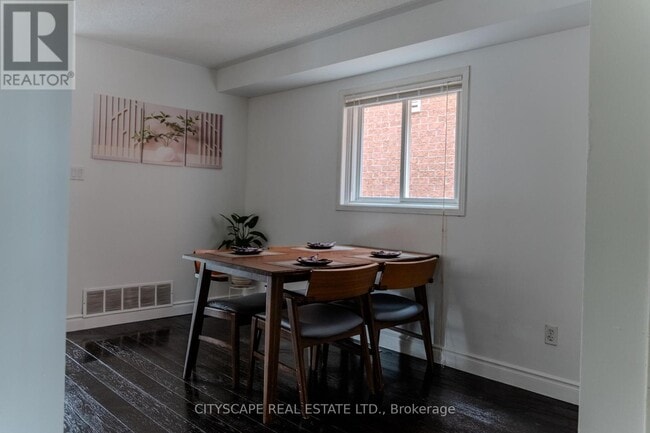 Building Photo - 5357 Floral Hill Crescent