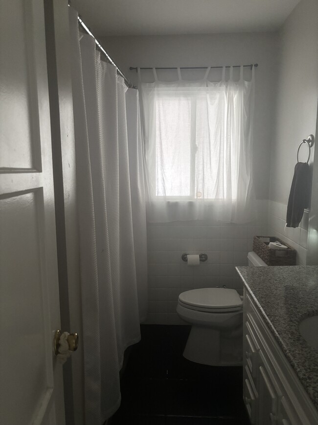 Bathroom with ample tub/shower and ample space - 4504 Keever Ave