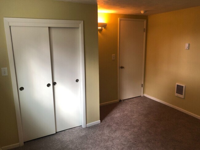 Building Photo - Updated Four Bedroom Home with New Lawn an...