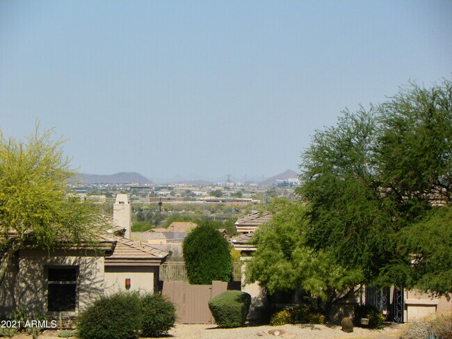 Building Photo - 10703 E Caribbean Ln