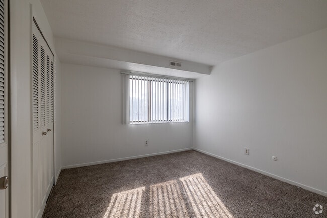 3BR, 2BA - 1,510SF - Primary Bedroom - Carlyle Tower Apartments - Southfield, MI