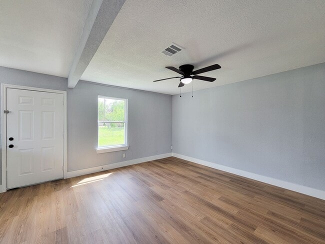 Photo - This beautifully updated 4-bedroom home is just under two miles from Highway 288 and Loop 610, ma...