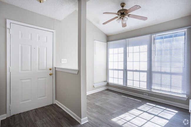 2BR, 2BA - 1,150SF - Living Room - About The Woods at Shannon Lake