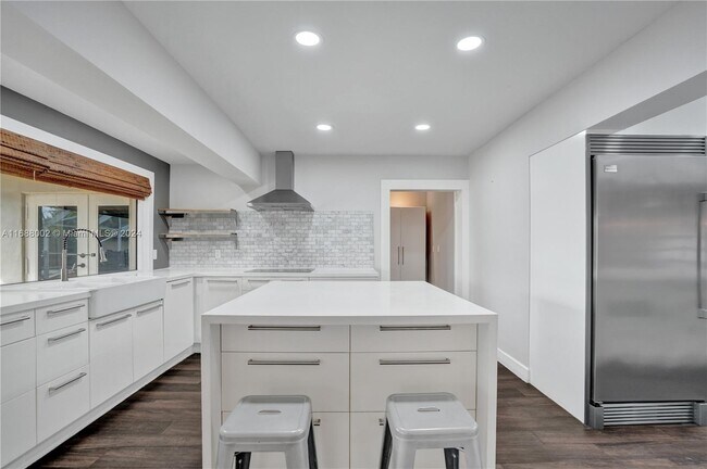 Foto del edificio - 6106 Royal Poinciana Ln