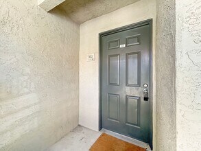 Building Photo - 7565 Charmant Dr