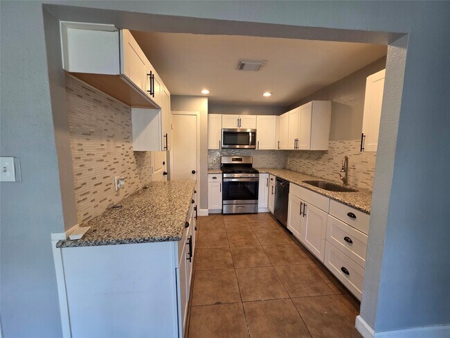 Foto del edificio - 1115 Rock Canyon Dr