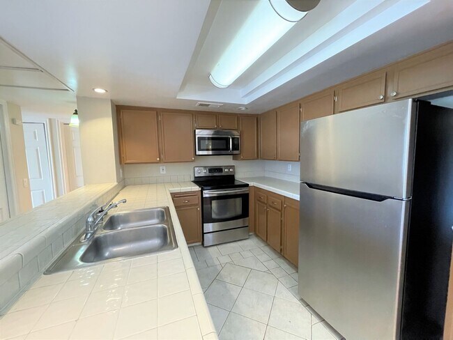 Building Photo - $500 Move In Special-Spacious Condo with D...