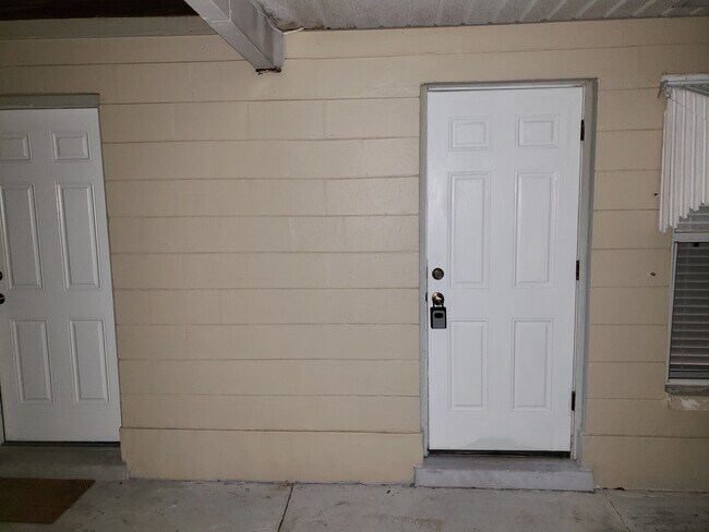 Carport Living Room & Front Guest Bedroom #1 Entrance doors - 829 Van Buren St