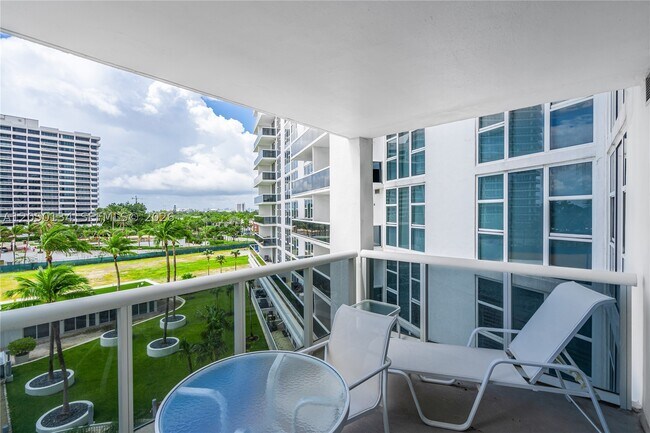 Building Photo - 10275 Collins Ave
