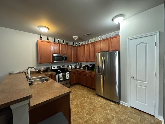 Building Photo - Welcome to this charming Condo ! "ASK ABOU...