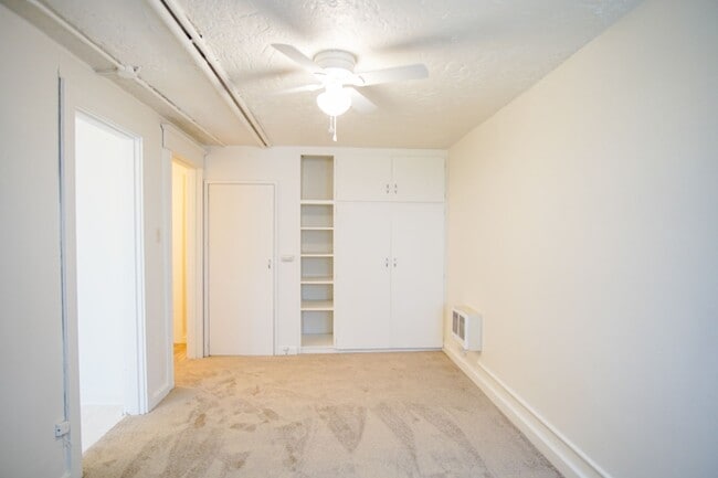 Building Photo - Close-in NE Daylight Basement Studio Ready...