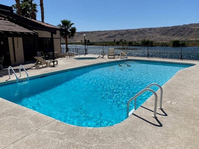 Building Photo - 2 BR Furnished, Gated complex on the water...