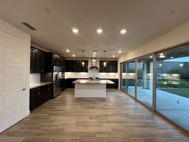 Building Photo - Beautiful Home With Large Primary Suite, Multiple Living Rooms, and more!