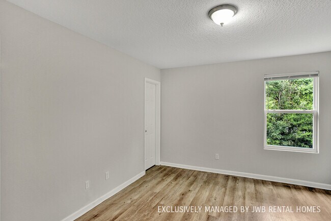 Foto del edificio - 6815 Lake Mist Ln