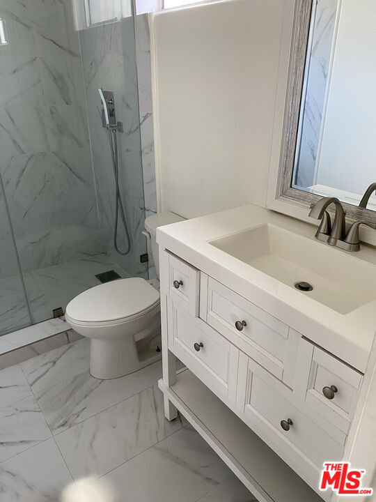 Building Photo - 451 S La Peer Dr