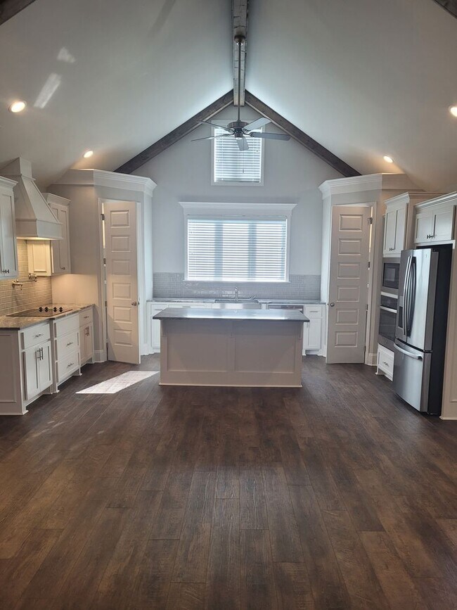 Building Photo - Spacious 4BR Home with Inground Pool, Open Split Floor Plan & Side-Entry Garage