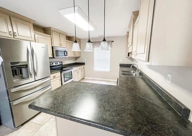 Foto del edificio - Charming 3/2 furnished home on quiet street