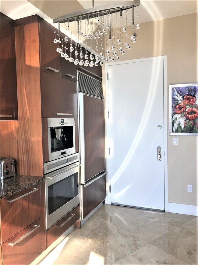 Kitchen with Sub-zero, Wolf & Bosh appliances - 15901 Collins Ave