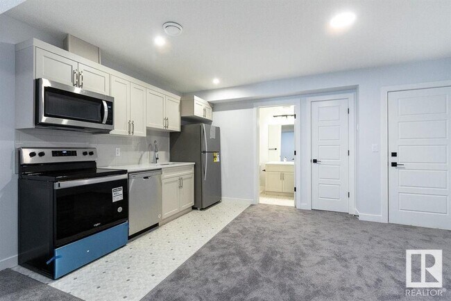 Photo du bâtiment - 32 Rosewood Wy