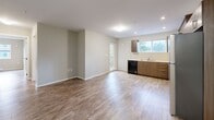 Located at 3142–3148 Jacklin Rd in Langford, BC, this single-floor, three-bedroom, two-bathroom unit offers a clean and modern living environment with a practical, well-organized layout. Throughout the unit, warm-toned luxury vinyl plank flooring provides a cohesive look, complemented by neutral walls and crisp white trim.

The open-concept living and dining area is bright and spacious, featuring a ductless mini-split system for efficient year-round climate control. The kitchen is equipped with warm wood-toned cabinetry, a built-in dishwasher, and a window that brings in natural light and views of the surrounding greenery. A sliding door provides access to a private balcony, adding to the unit's connection to the outdoors.

The primary bedroom is generously sized, offering ample room for furnishings, while the two additional bedrooms each feature windows that allow natural light and views of the neighbourhood. A dedicated closet provides convenient storage.

Both bathrooms are finished consistently with wood-toned vanities, light countertops, tub-shower combinations, and tile-style flooring. A dedicated laundry room houses a full-sized side-by-side washer and dryer with overhead shelving, adding everyday convenience. The hallway connects all rooms efficiently, completing this well-appointed residential unit.