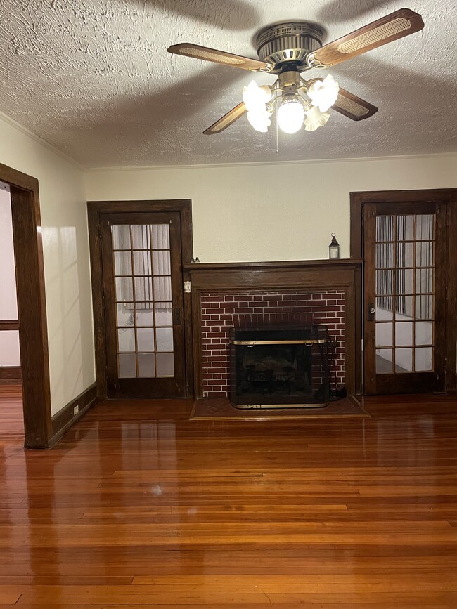 Classic fireplace and french doors - 340 Highland Ave