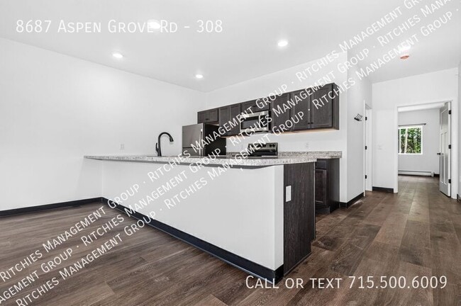 Building Photo - 8687 Aspen Ln