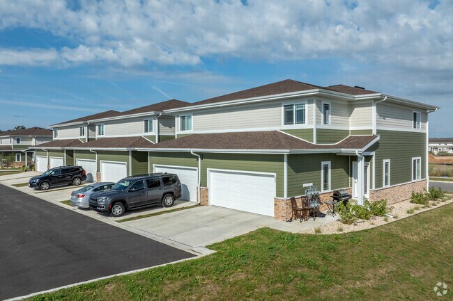 Each Townhome as an attached garage! - The Townhomes at Hartung Fields