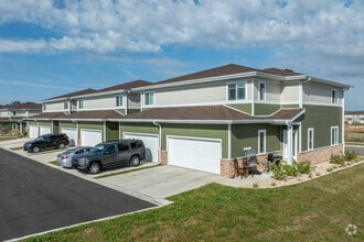 Each Townhome as an attached garage! - The Townhomes at Hartung Fields