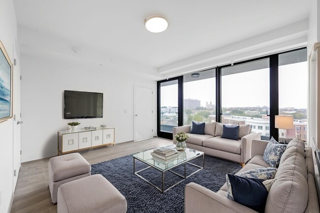 Living room w/ floor to ceiling windows - Hoyt Tower