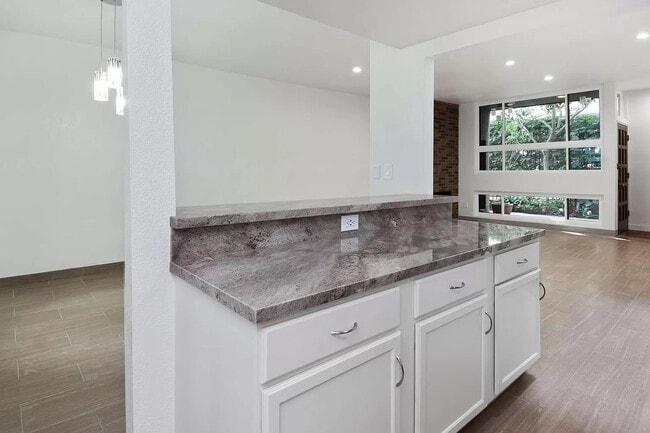 From kitchen looking towards dining/ living room. This is a GREAT Floor Plan for entertaining! - 10315 Missouri Ave