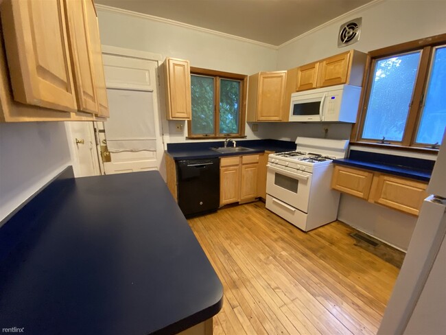Building Photo - 4 br, 2 bath House - 712 E Kingsley St 712...