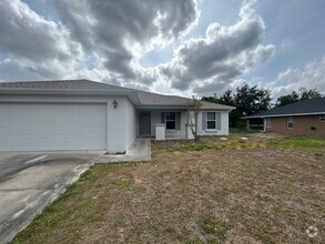 Building Photo - 6012 Thrush Ave
